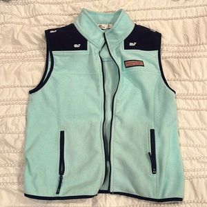 Vineyard Vines green pique vest with blue trim and whale accents on shoulders.